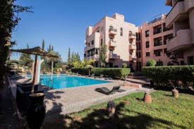 A VENDRE bel APPARTEMENT 120M 3 façades situé à premium village Marrakec